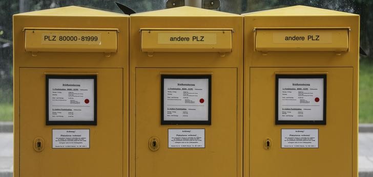 © Reuters. Letterboxes of German mail carrier Deutsche Post are seen during a demonstration in Munich