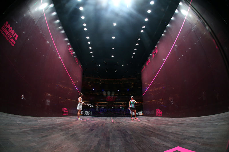 © Reuters. Players compete in the PSA World Tour Finals in an undated photograph handed out by the tournament organisers, in Dubai