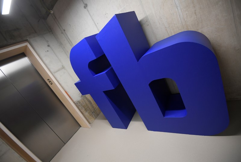 © Reuters. A giant logo is seen at Facebook's headquarters in London