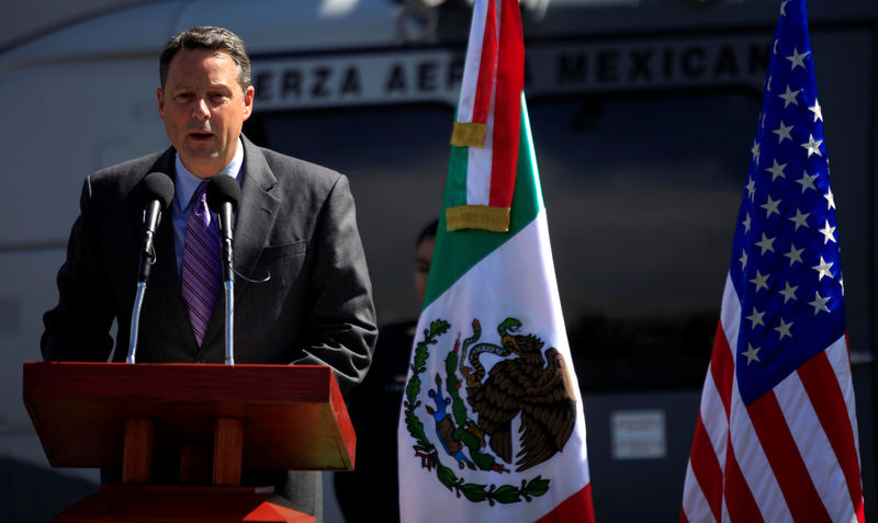 © Reuters. FILE PHOTO: U.S. Deputy Chief of Mission John Feeley in Mexico speaks during a ceremony at a hangar of Secretariat of National Defense in Mexico City