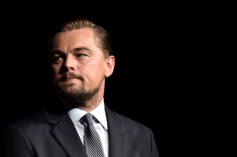 © Reuters. FILE PHOTO: US actor Leonardo DiCaprio looks on prior to speaking on stage during the Paris premiere of the documentary film "Before the Flood" in Paris