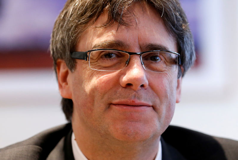 © Reuters. Ex-líder catalão, Carles Puigdemont, durante encontro do 