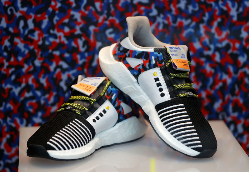 © Reuters. Adidas limited-edition sneakers that match the Berlin subway seat design are displayed in Berlin