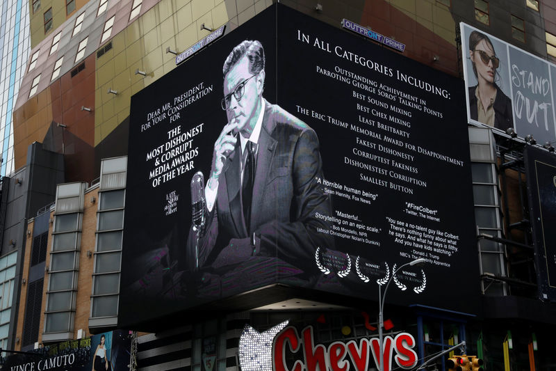 © Reuters. A billboard for late-night talk show host Stephen Colbert is seen near Times Square in the Manhattan borough of New York City
