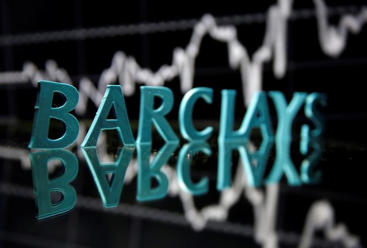 © Reuters. The Barclays logo is seen in front of displayed stock graph in this illustration