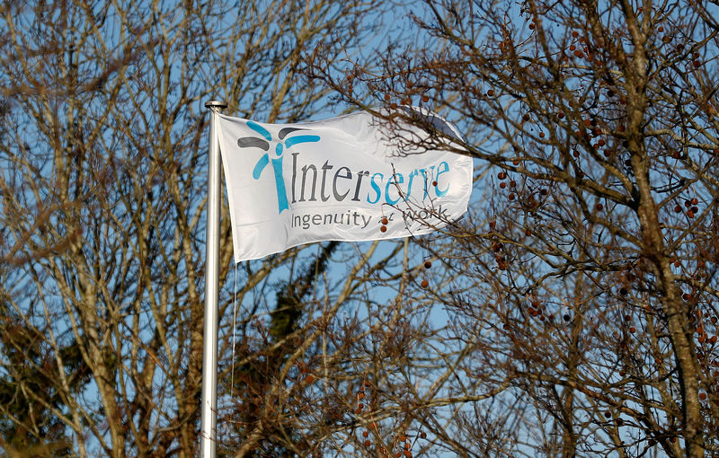© Reuters. The Interserve logo is seen on a flag at Interserve offices in Twyford