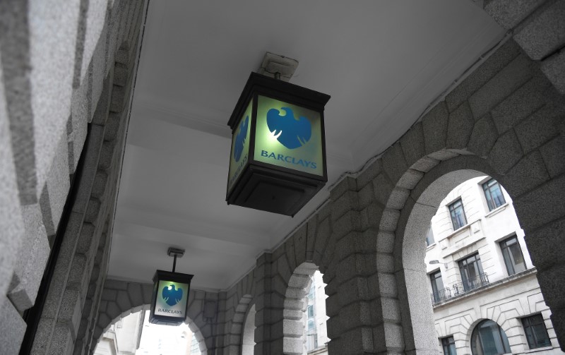 © Reuters. The logo of Barclays bank is seen on glass lamps outside of a branch of the bank in the City of London financial district in London