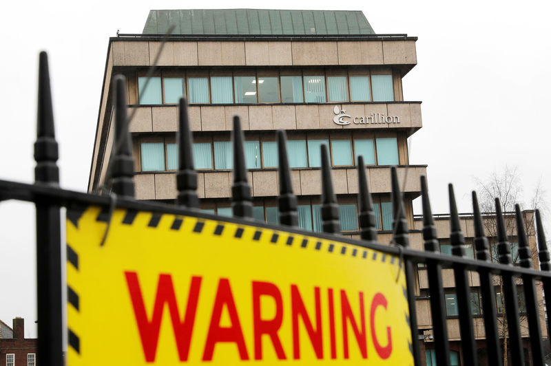 © Reuters. A parking sign is seen on railings outside Carillion's headquarters after the company went into liquidation, in Wolverhampton
