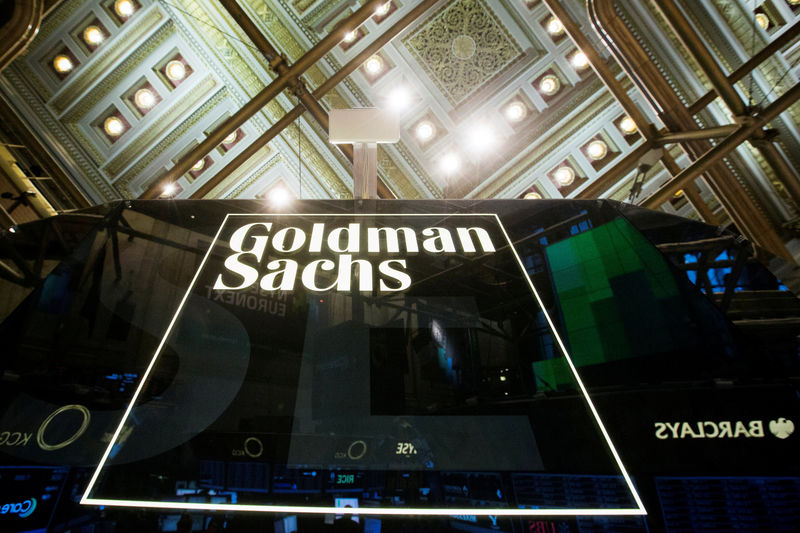 © Reuters. FILE PHOTO - Goldman Sachs sign is seen above floor of the New York Stock Exchange shortly after the opening bell in the Manhattan borough of New York