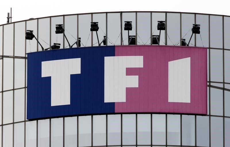© Reuters. TF1 ACQUIERT 78% D'AUFEMININ, OPA PRÉVUE SUR LES MINORITAIRES