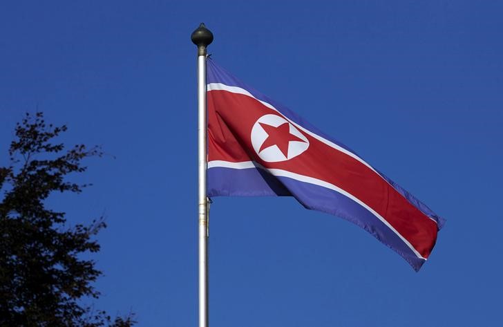 © Reuters. FILE PHOTO - North Korean flag flies on a mast at the Permanent Mission of North Korea in Geneva