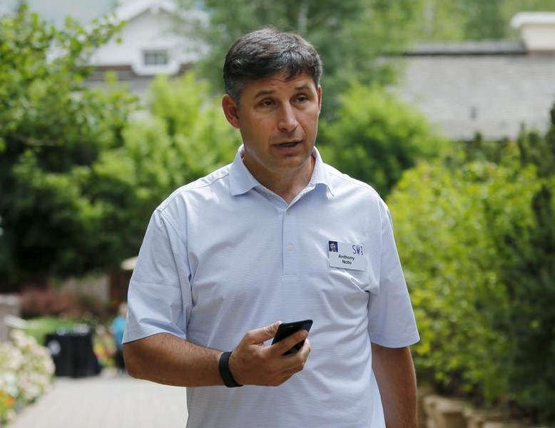 © Reuters. Chief Financial Officer of Twitter Noto holds his phone during the first day of the annual Allen and Co. media conference in Sun Valley