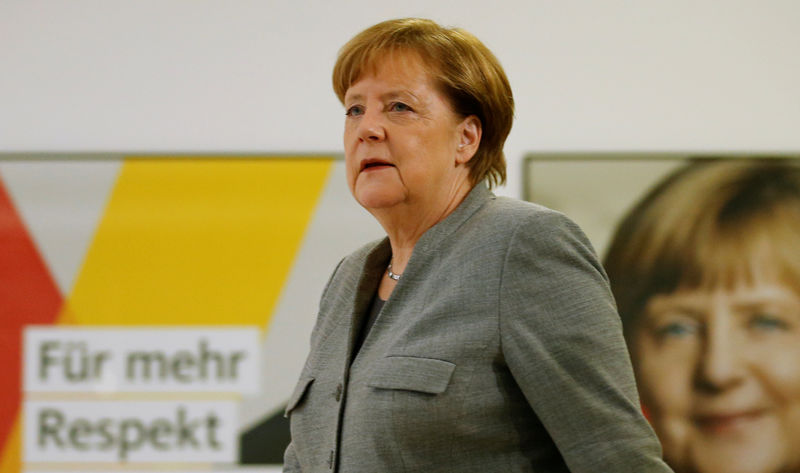 © Reuters. German Chancellor Angela Merkel gives a statement in Berlin