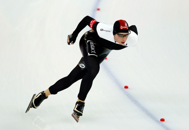 © Reuters. FILE PHOTO: Belchos of Canada competes during the men's 5000m event at the Essent ISU World Single Distances Championships 2013 in Sochi