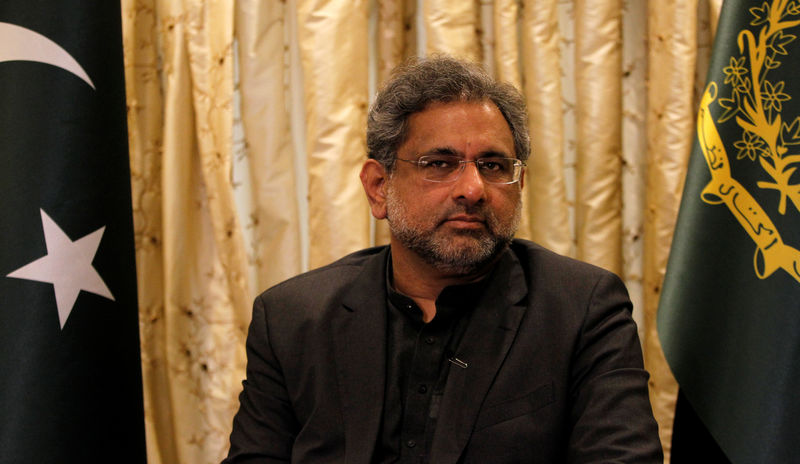 © Reuters. Pakistani Prime Minister Shahid Khaqan Abbasi speaks during an interview with Reuters in Islamabad