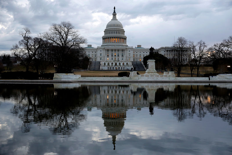 © Reuters. Clouds pass over the U.S. Capitol at the start of the third day of a shut down of the federal government in Washington