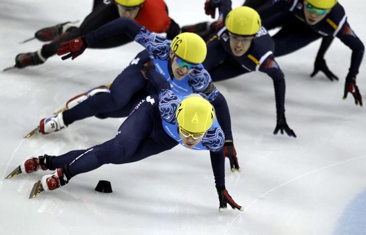 © Reuters. Viktor Ahn of Russia competes in the men's 1500m final race during the ISU Short Track World Cup speed skating competition in Shanghai