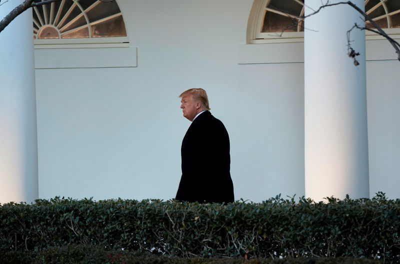 © Reuters. President Donald Trump walks to the Oval Office of the White House