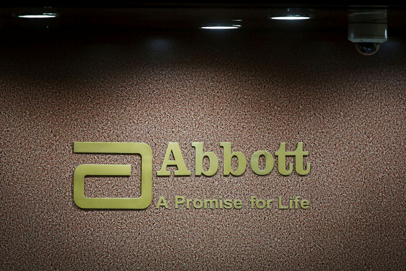 © Reuters. FILE PHOTO: An Abbott company logo is pictured at the reception of its office in Mumbai