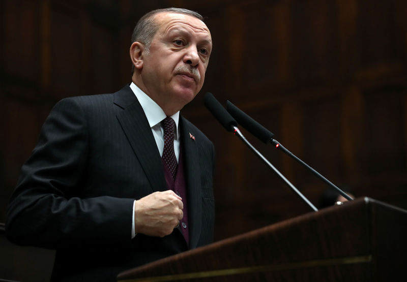 © Reuters. Turkish President Tayyip Erdogan addresses members of parliament from his ruling AK Party during a meeting at the Turkish parliament in Ankara