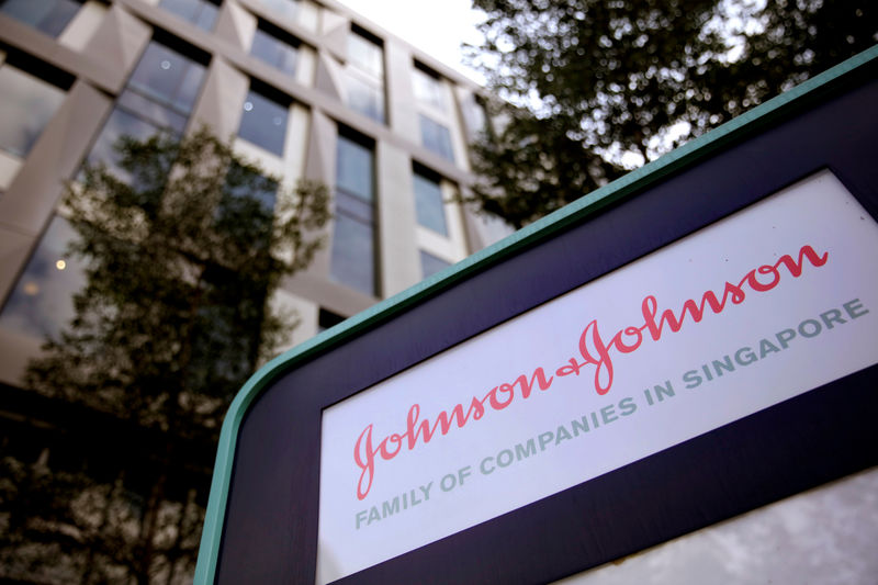 © Reuters. FILE PHOTO: Johnson and Johnson logo is seen at an office building in Singapore