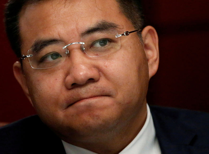 © Reuters. FILE PHOTO - Key Safety Systems Chief Executive Officer Jason Luo listens to a question during an interview with Reuters in Tokyo, Japan