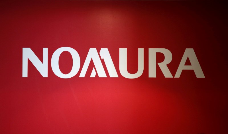 © Reuters. FILE PHOTO: Logo of Nomura Holdings is pictured in Tokyo
