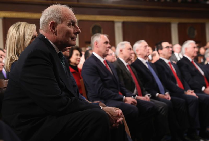 © Reuters. White House Chief of Staff John Kelly listens as U.S. President Donald Trump delivers his first State of the Union address in Washington