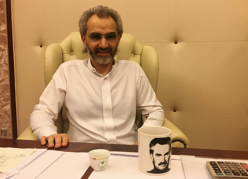 © Reuters. FILE PHOTO - Saudi Arabian billionaire Prince Alwaleed bin Talal sits for an interview with Reuters in the office of the suite where he has been detained at the Ritz-Carlton in Riyadh, Saudi Arabia