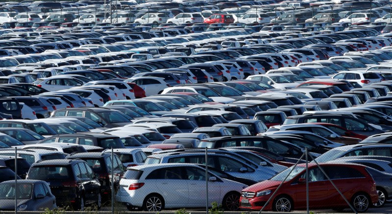 © Reuters. New cars are seen in a carpark near Barcelona