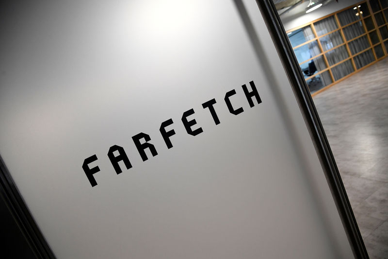 © Reuters. Branding for online fashion house Farfetch is seen at the company headquarters in London