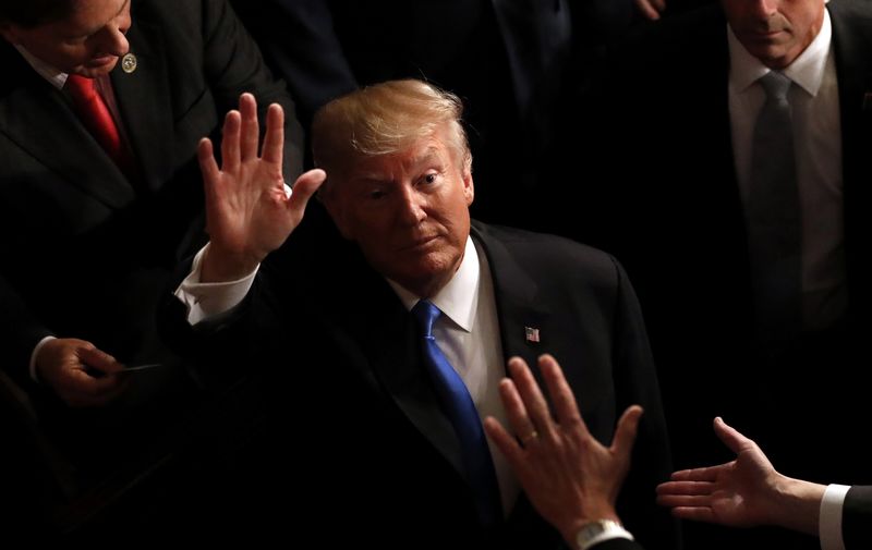 © Reuters. President Trump departs after delivering his State of the Union address in Washington