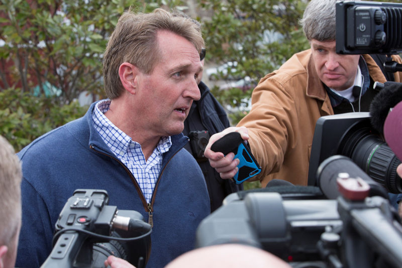 © Reuters. U.S. Senator Flake talks with reporters after Amtrak passenger train carrying Republican members of Congress collided with a garbage truck in Charlottesville, Virginia