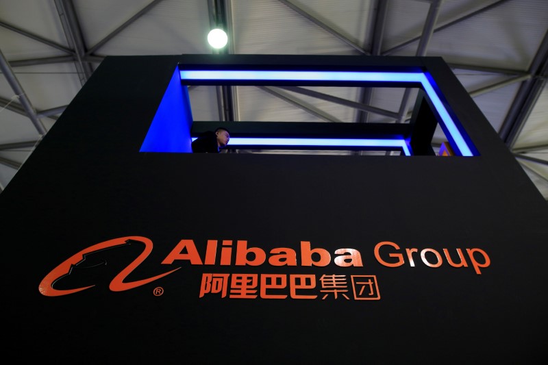 © Reuters. FILE PHOTO - A sign of Alibaba Group is seen at CES Asia 2016 in Shanghai