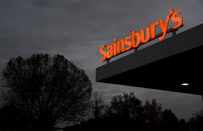 © Reuters. Sainsbury's signage is seen at a supermarket and petrol station in west London, Britain