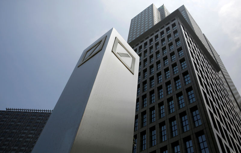 © Reuters. FILE PHOTO: Logos of Deutsche Bank AG are seen in Tokyo