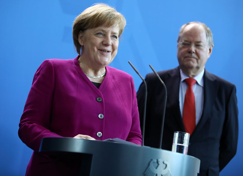 © Reuters. La negociación de coalición alemana busca superar disputas por sanidad y empleo