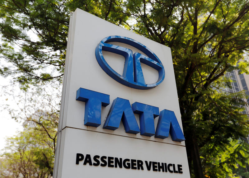 © Reuters. A Tata Motors logo is pictured outside the company showroom in Mumbai