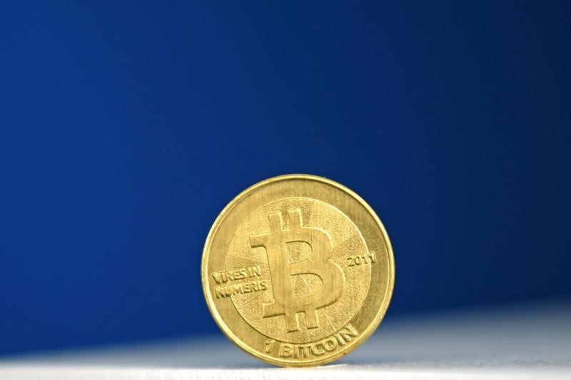 © Reuters. A Bitcoin (virtual currency) coin is seen in an illustration picture taken at La Maison du Bitcoin in Paris