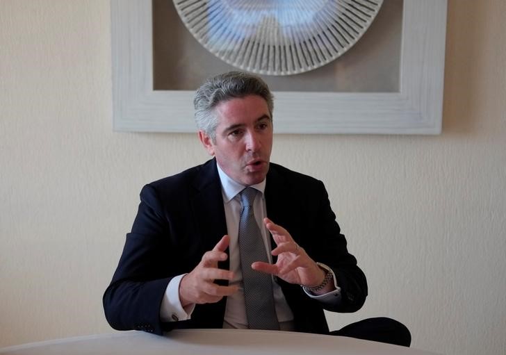 © Reuters. Embraer's commercial aviation chief John Slattery talks to Reuters during the IATA meeting in Cancun