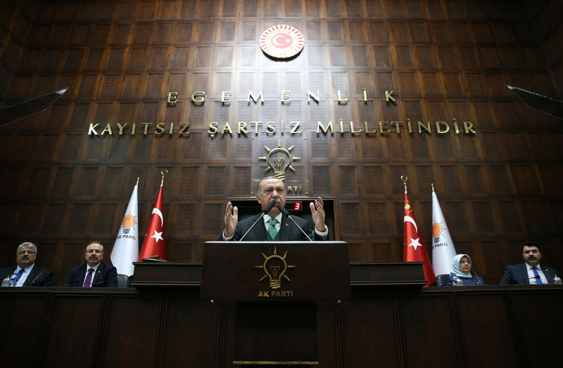 © Reuters. Turkish President Tayyip Erdogan addresses members of parliament from his ruling AK Party during a meeting in Ankara