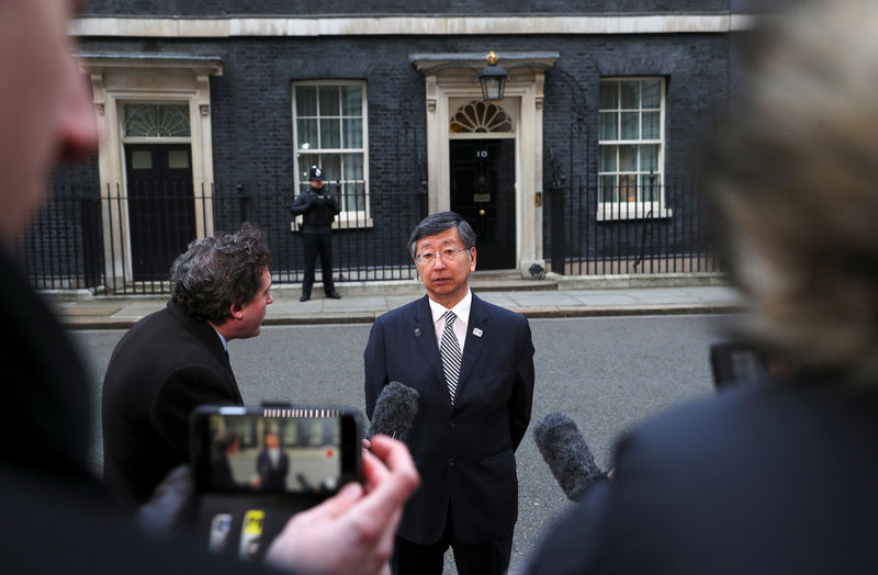 © Reuters. Koji Tsuruoaka, Japan's ambassador to Britain, speaks outside 10 Downing Street after a meeting between Britain's Prime Minister Theresa May and senior members of Japanese companies, in London