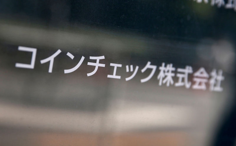 © Reuters. FILE PHOTO: Cryptocurrency exchange Coincheck's signboard is pictured in front of a building where their office is located, in Tokyo