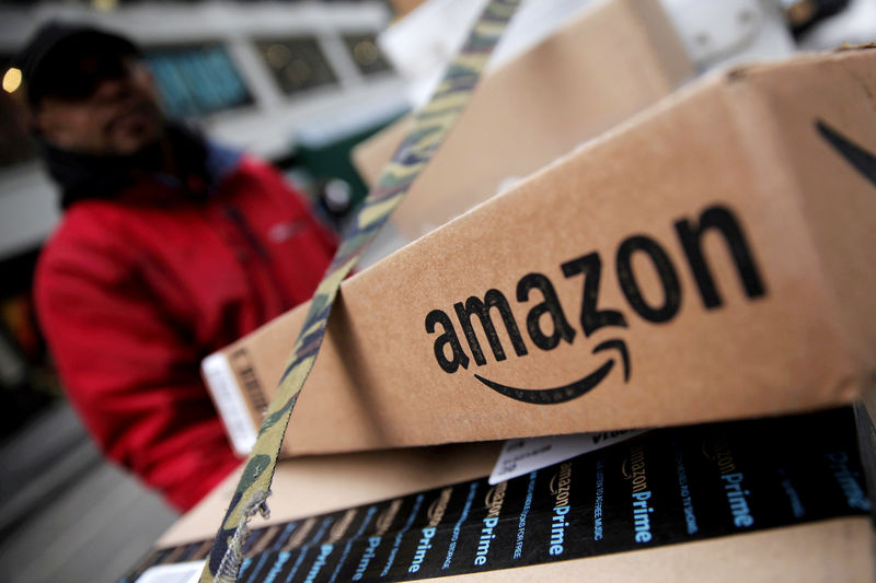 © Reuters. FILE PHOTO: Amazon boxes are seen stacked for delivery in Manhattan