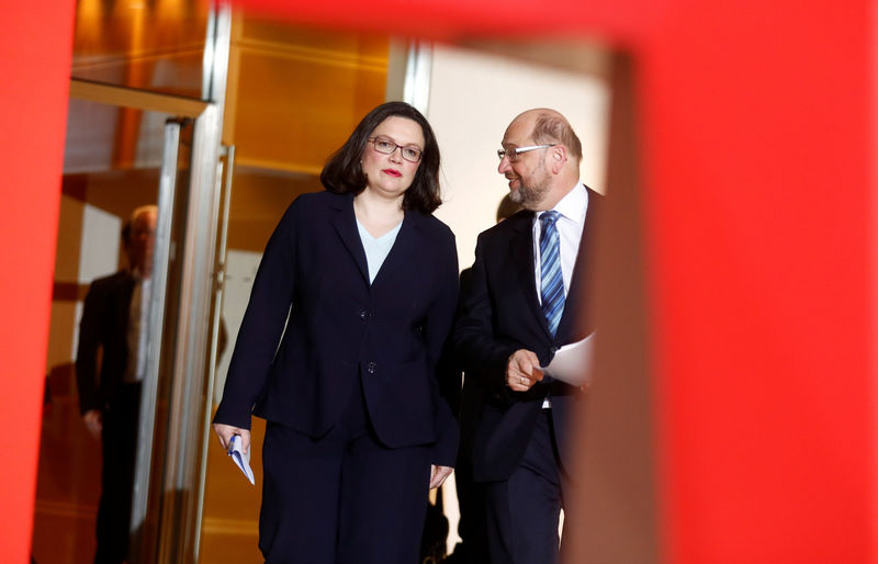 © Reuters. Social Democratic Party (SPD) leader Schulz and incoming party leader Nahles arrive to a news conference at the party headquarters in Berlin