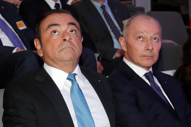 © Reuters. Carlos Ghosn, Chairman and CEO of the Renault-Nissan Alliance and Groupe Renault chief competitive officer Thierry Bollore attend a news conference to unveil Renault next mid-term strategic plan in Paris