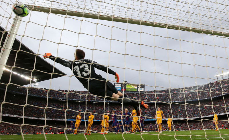 © Reuters. Messi eleva a 8 puntos la ventaja del Barça sobre el Atlético