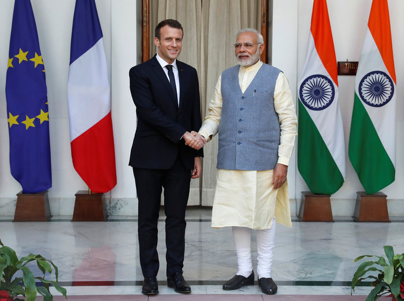 © Reuters. MACRON OUVRE UNE "NOUVELLE ÈRE" DU PARTENARIAT AVEC L'INDE