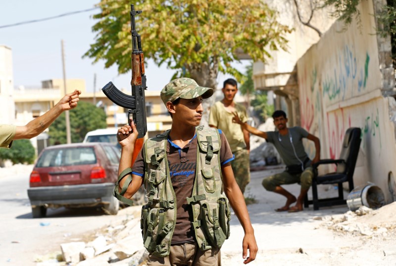 © Reuters. الجيش السوري الحر: مقاتلونا دخلوا مدينة عفرين وانسحاب القوات الكردية