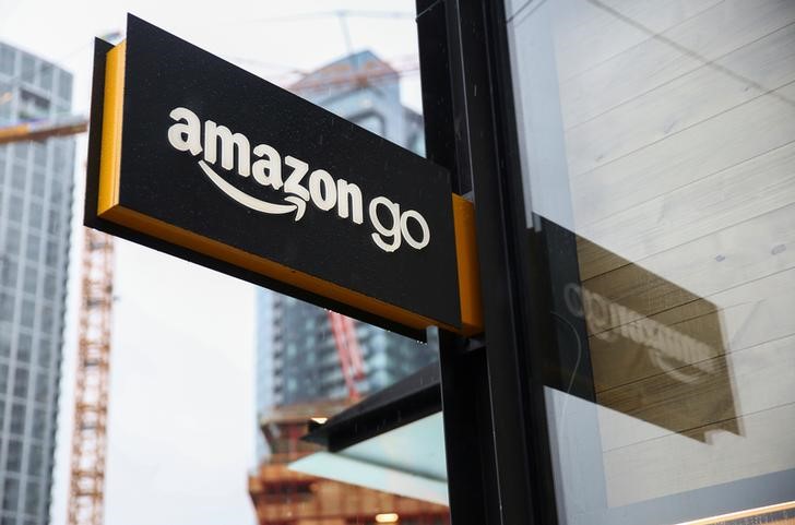 © Reuters. FILE PHOTO: A sign for the new Amazon Go store on 7th Avenue at Amazon's Seattle headquarters in Seattle